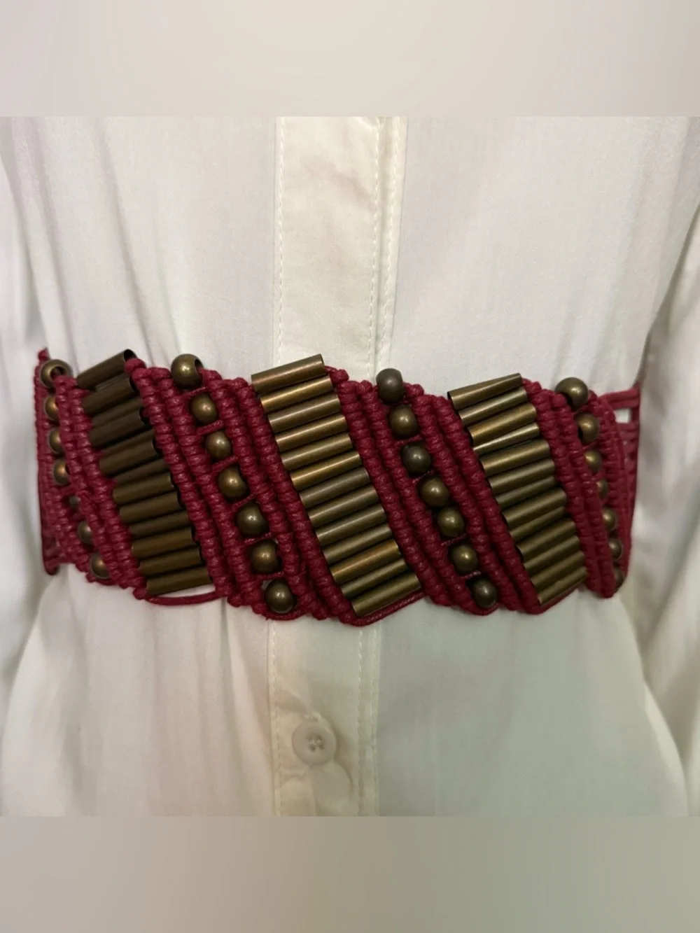Burgundy elastic waistband belt with brass tone details